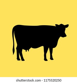 Cow vector icon illustration isolated on yellow background