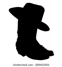 Cowboy boots. Vector black silhouette of cowboy boots and western hat isolated on white