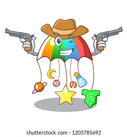 Cowboy character hanging toy attached to cot