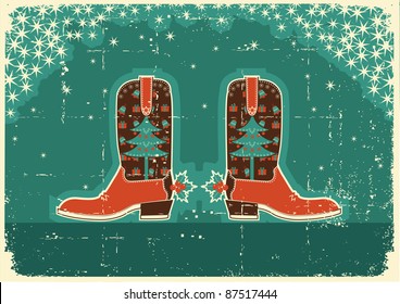 Cowboy christmas  card with boots and holiday decoration on old paper texture