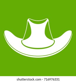 Cowboy hat icon white isolated on green background. Vector illustration