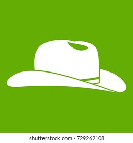 Cowboy hat icon white isolated on green background. Vector illustration