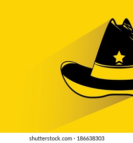 cowboy hat on yellow background