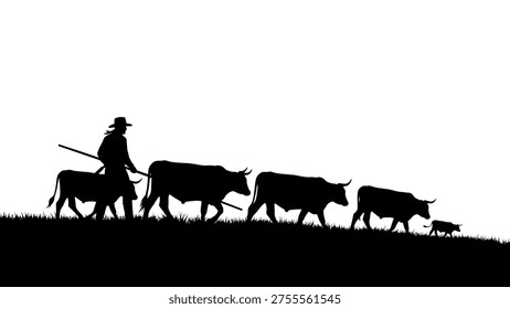 Cowboy herding cattle across grassy hill