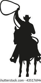 Cowboy with lasso on a horse silhouette