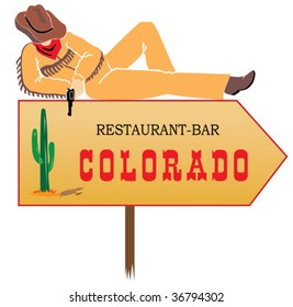 Cowboy lying on the guide sign