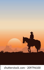Cowboy riding horse silhouette