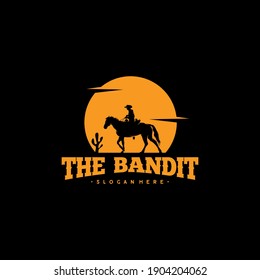 Cowboy Riding Horse Silhouette at Night logo