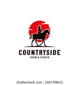 Cowboy Riding Horse Silhouette at Sunset logo