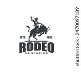 cowboy riding a raging bull rodeo silhouette logo vector illustration