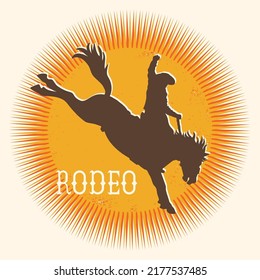 Cowboy Rodeo salvaje de caballo vector símbolo redondo. Silhouette de Cowboy montando un caballo salvaje sobre el sol amarillo en símbolo ilustración de estilo plano con rodeo de texto aislado