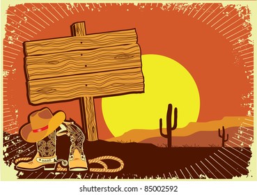 Cowboy's landscape .Grunge wild western background of sunset with boots