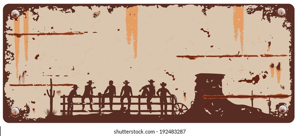 Cowboys sitting on fence sign