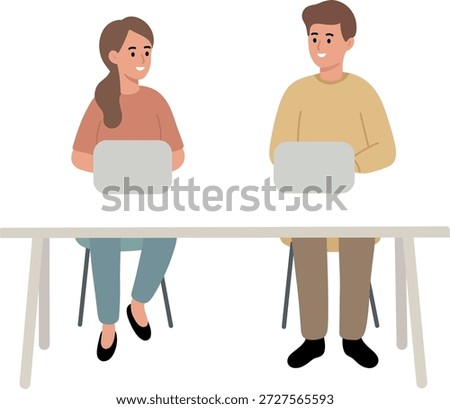 Coworkers Using Laptops Team Members at Table