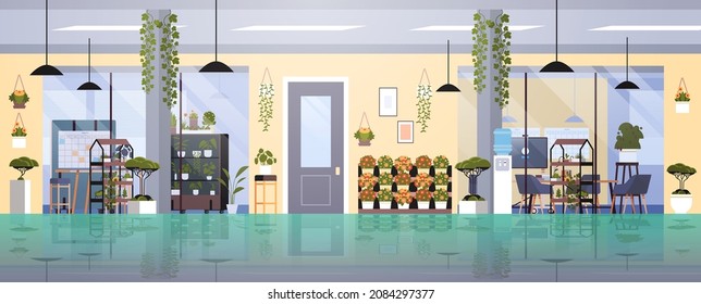 coworking center with potted plants and flowers on shelves gardening concept office interior horizontal