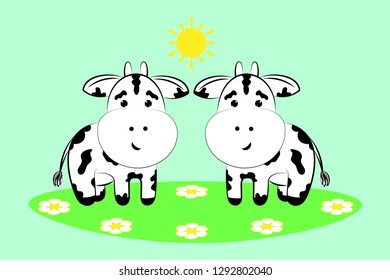 Cows in a flower meadow.  