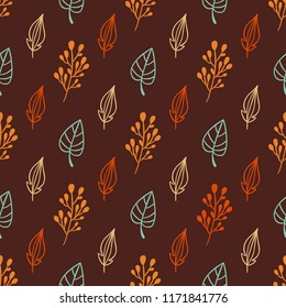 Cozy autumn hand drawn seamless vector pattern. Forest leaves and herbs doodle background in colors of brown, orange and beige. Modern botanic texture