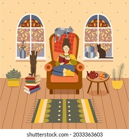 Cozy autumn at home. Girl sitting in armchair with book and reading in homely atmosphere with cats, houseplants, teapot and knitting. Woman with her kitties. Hygge fall at home concept illustration.