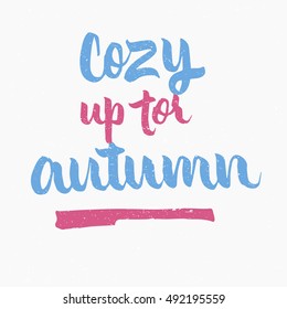 Cozy up for autumn quote. Ink hand lettering. Modern brush calligraphy. Handwritten phrase. Inspiration graphic design typography element. Cute simple vector sign.
