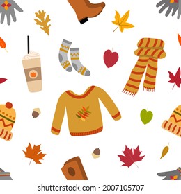 Cozy autumn warm things seamless pattern. Knitted orange sweater, comfy gray socks, warm scarf, comfy hat, fall leaves. Isolated on white background. Great for stickers, prints, textiles, wrappers.