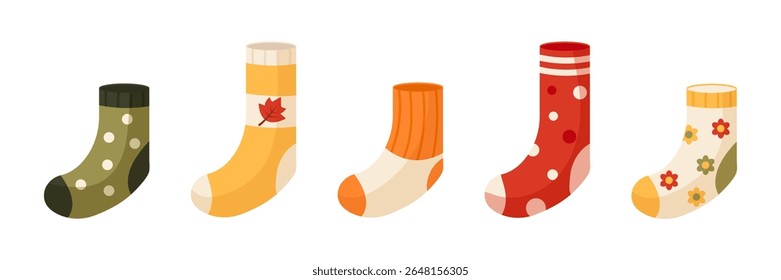 Cozy autumn and winter socks clipart set. Colorful seasonal accessories in flat style. Vector illustration for warm clothing design.