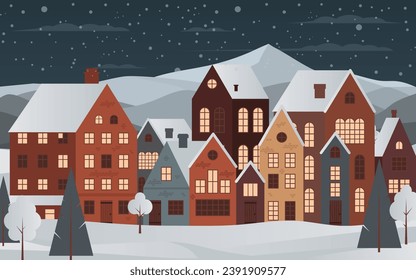 Cozy charming winter night panorama of a small town with houses with window lights, trees, and snow. For Christmas cards and greetings. Winter magic with its snowy landscape. Not AI generated.