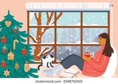 Cozy Christmas illustration with woman, fir tree, cat.Cute girl is sitting on the windowsill and drinking tea.There is snowfall and a city outside the window.Vector flat color design,winter season.