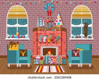 Cozy Christmas living room with fireplace, gifts, armchairs and cats. Cozy Christmas or New Year Eve at home interior with pets, festive garlands, Xmas wreath, tin soldier and stocking.