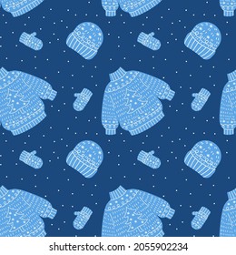 Cozy Christmas warm seamless pattern. Knitted sweater, gat and mittens festive illustration. New year cute handmade clothing.