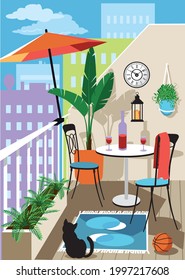 Cozy decorated urban balcony with a set of garden furniture, plants and umbrella