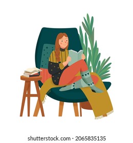 Cozy home composition with character of girl in warm clothes reading book in lounge chair vector illustration
