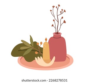 Cozy home composition with flowers in ceramic vase, candle in hand made holder and plant on tray