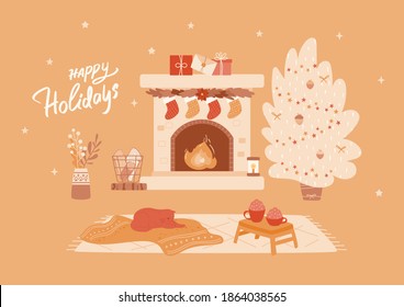 Cozy home. New Year interior with fireplace, socks decor, Christmas tree, cute cat lying on blanket and two cups of hot sweet drink standing on little table. Happy Holidays handwritten lettering.