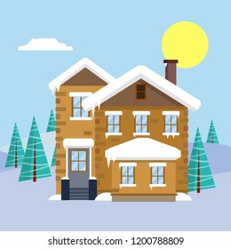 Cozy house in the winter snow. Two-storey building on the natural landscape. Forest with trees in the background. Cold weather.
