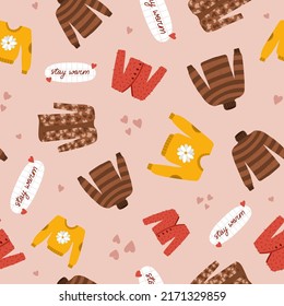 Cozy and hygge vector seamless hand drawn pattern with hygge autumn clip arts of seasonal clothes, food and drinks, decor. Can be used for, wrapping paper, bedclothes, notebook, packages, gift paper.