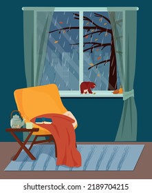 Cozy interior, rainy autumn evening at home. A room with an armchair and a tea table.  Vector illustration.