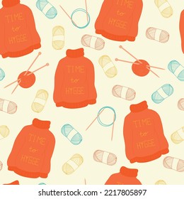 Acogedor patrón de punto sin fisuras. Una postal cálida con manchas de hilo y agujas de punto. Embalaje de la aguja. Productos de lana con sus propias manos. hecho a mano. Ilustración de material vectorial.
