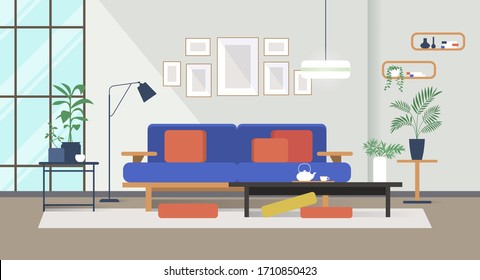 Cozy modern living room interior design with sofa, coffee table and indoor plants