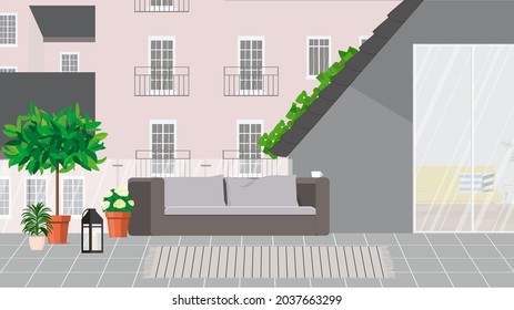 Cozy rooftop balcony with furniture and plants