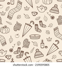 Cozy seamless pattern with autumn items pumpkin, umbrella, pie, scarf, socks, leaves. For fall decoration, autumn fest invitations, fabric, kitchen textile and cover print, gift and wrapping paper.