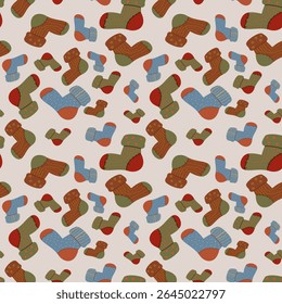 Aconchegante padrão sem emenda de meias de lã quente nas cores do outono. Perfeito para fundos sazonais, envoltório de presente de férias, papelaria e decoração de casa.