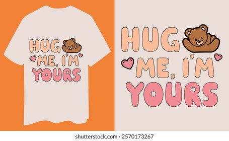 A cozy t-shirt with bold "Hug Me I'm Yours" text, a teddy bear graphic, and scattered hearts, making it ideal for expressing love.