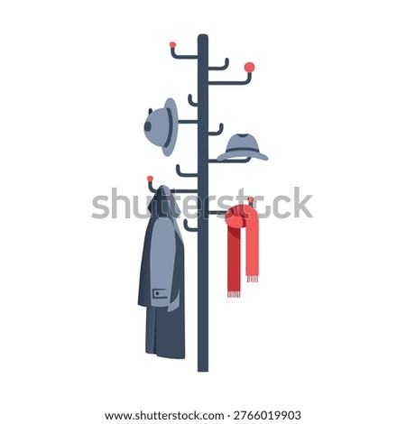 Cozy winter essentials arranged on modern coat stand with overcoat, hats, and scarf hanging in neat order..