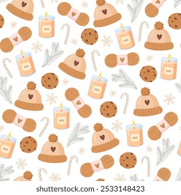 Cozy winter seamless pattern with warm hat, candy canes, biscuits, pine branches, burning candles, snowflakes, wool rolls isolated on white background.