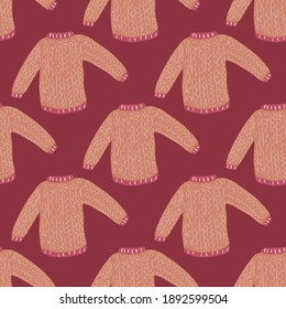Cozy winter sweater doodle seamless pattern. Clothes backdrop in red and maroon pale tones. Vector illustration for seasonal textile prints, fabric, banners, backdrops and wallpapers.
