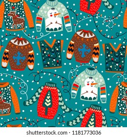 Cozy winter sweaters. Hand drawn colored vector seamless pattern. Blue background