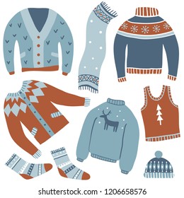 Cozy winter. Vector set of cute winter clothes: sweaters, socks, hats, scarf. Hand draw collection of sweaters with norwegian ornaments. New Year and winter holiday symbols