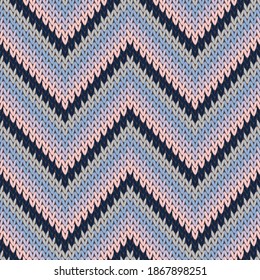Cozy zigzag chevron stripes christmas knit geometric seamless pattern. Ugly sweater knitting pattern imitation. Traditional seamless knitted pattern. Christmas spirit backdrop.