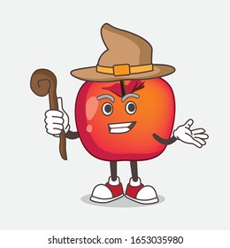 Crab Apple cartoon mascot character as a witch on the stage