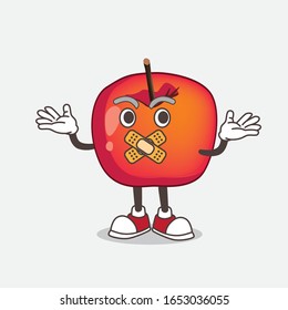 Crab Apple cartoon mascot character making a silent gesture